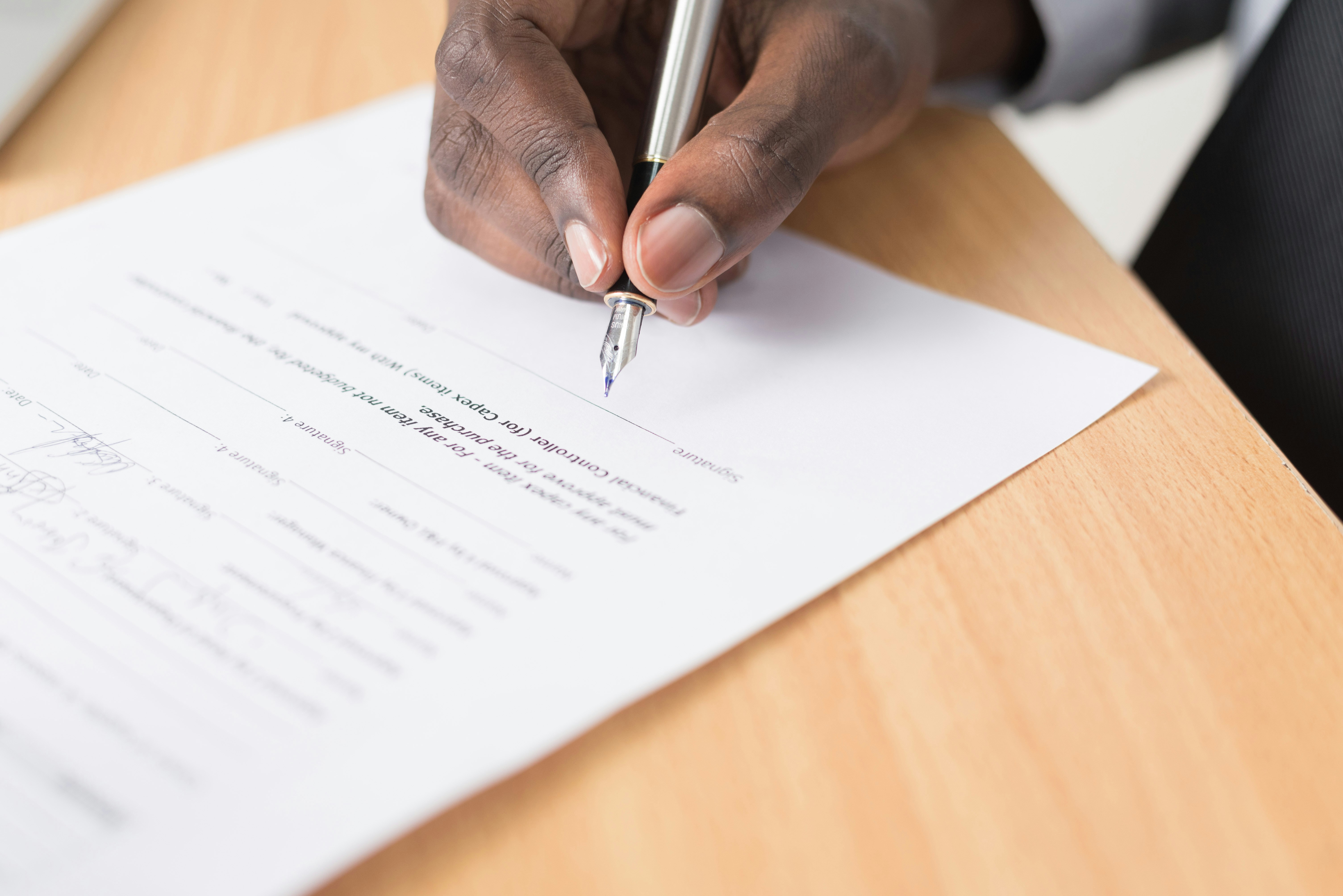 Handwritten Signature on a Paper Document